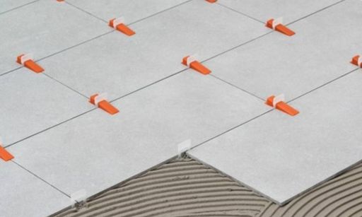 Where can you use a tile leveling system?